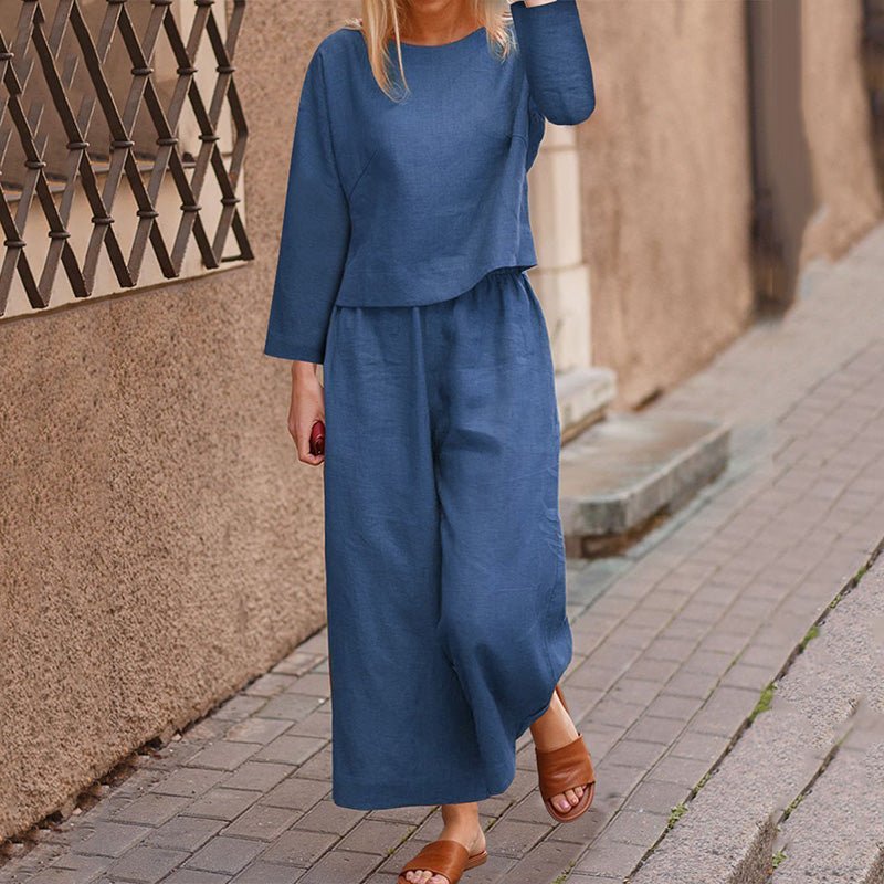 021965A7-4FF6-1229-43A8-EB87548519BE.jpg Casual Loose Solid Color Top Pants Two-piece Set - Image 1